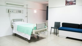 hospital-bed-near-couch.jpg hospital bed near couch